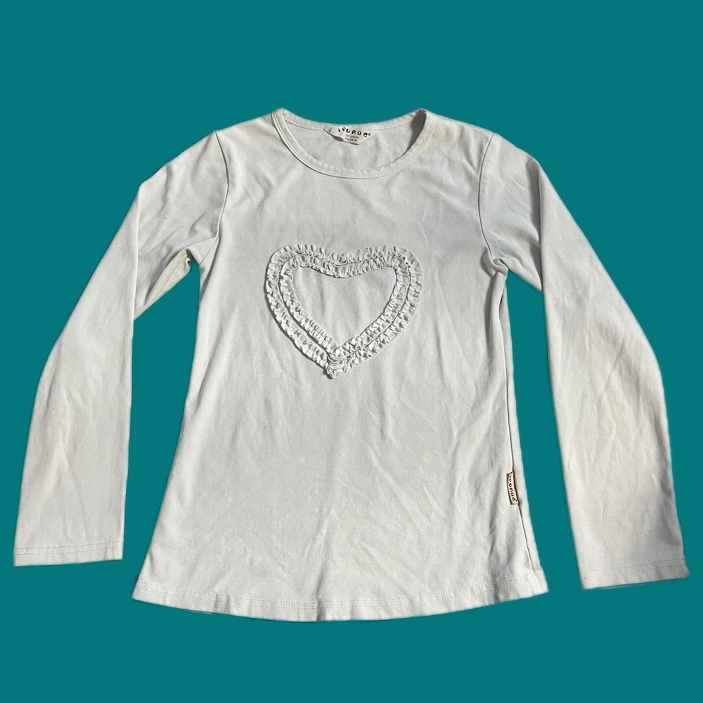 White long sleeve with white heart on chest